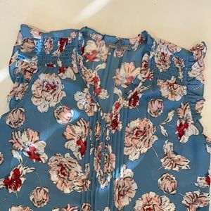 Ruffled sleeveless blouse